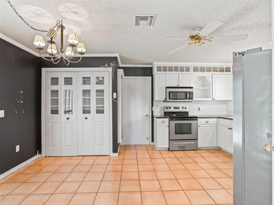 Welcome to this charming El Cancun Courtyard Villa offering on El Diablo Executive Golf Course in Florida - for sale on GolfHomes.com, golf home, golf lot