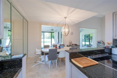 Beautifully upgraded end-unit townhome with stunning lake and on Boca Pointe Country Club in Florida - for sale on GolfHomes.com, golf home, golf lot