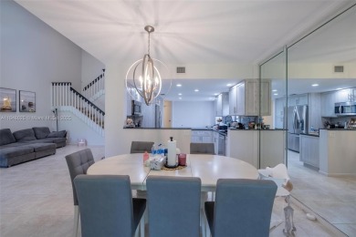 Beautifully upgraded end-unit townhome with stunning lake and on Boca Pointe Country Club in Florida - for sale on GolfHomes.com, golf home, golf lot