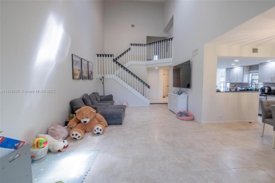 Beautifully upgraded end-unit townhome with stunning lake and on Boca Pointe Country Club in Florida - for sale on GolfHomes.com, golf home, golf lot