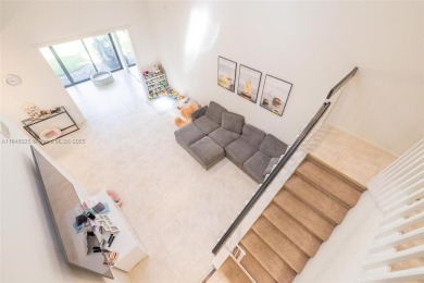 Beautifully upgraded end-unit townhome with stunning lake and on Boca Pointe Country Club in Florida - for sale on GolfHomes.com, golf home, golf lot