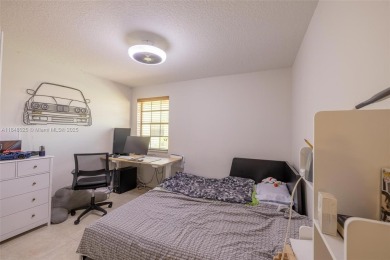 Beautifully upgraded end-unit townhome with stunning lake and on Boca Pointe Country Club in Florida - for sale on GolfHomes.com, golf home, golf lot