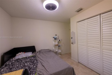Beautifully upgraded end-unit townhome with stunning lake and on Boca Pointe Country Club in Florida - for sale on GolfHomes.com, golf home, golf lot