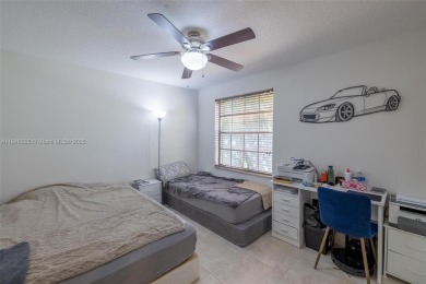 Beautifully upgraded end-unit townhome with stunning lake and on Boca Pointe Country Club in Florida - for sale on GolfHomes.com, golf home, golf lot