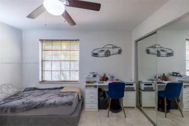 Beautifully upgraded end-unit townhome with stunning lake and on Boca Pointe Country Club in Florida - for sale on GolfHomes.com, golf home, golf lot