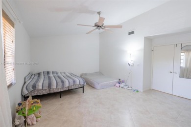 Beautifully upgraded end-unit townhome with stunning lake and on Boca Pointe Country Club in Florida - for sale on GolfHomes.com, golf home, golf lot