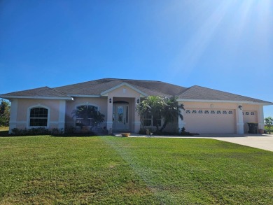 GORGEOUS LAKEFRONT HOME LOCATED ON OVER .6 ACRE LOT. QUALITY on Spring Lake Golf Resort in Florida - for sale on GolfHomes.com, golf home, golf lot