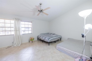 Beautifully upgraded end-unit townhome with stunning lake and on Boca Pointe Country Club in Florida - for sale on GolfHomes.com, golf home, golf lot