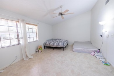 Beautifully upgraded end-unit townhome with stunning lake and on Boca Pointe Country Club in Florida - for sale on GolfHomes.com, golf home, golf lot