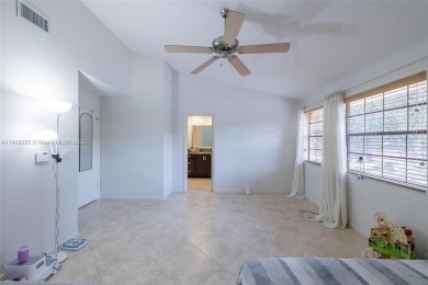 Beautifully upgraded end-unit townhome with stunning lake and on Boca Pointe Country Club in Florida - for sale on GolfHomes.com, golf home, golf lot