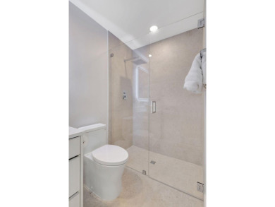Experience unparalleled luxury in this fully renovated home on Monarch Country Club in Florida - for sale on GolfHomes.com, golf home, golf lot