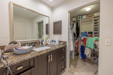 Beautifully upgraded end-unit townhome with stunning lake and on Boca Pointe Country Club in Florida - for sale on GolfHomes.com, golf home, golf lot