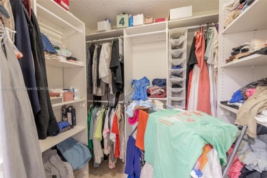 Beautifully upgraded end-unit townhome with stunning lake and on Boca Pointe Country Club in Florida - for sale on GolfHomes.com, golf home, golf lot