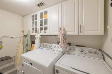 Beautifully upgraded end-unit townhome with stunning lake and on Boca Pointe Country Club in Florida - for sale on GolfHomes.com, golf home, golf lot