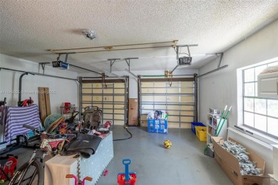 Beautifully upgraded end-unit townhome with stunning lake and on Boca Pointe Country Club in Florida - for sale on GolfHomes.com, golf home, golf lot
