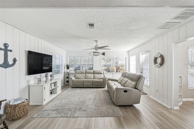 Welcome to this stunning, FULLY-REMODELED home located on a on Meadow Oaks Golf and Country Club in Florida - for sale on GolfHomes.com, golf home, golf lot