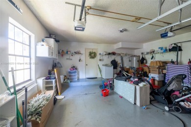 Beautifully upgraded end-unit townhome with stunning lake and on Boca Pointe Country Club in Florida - for sale on GolfHomes.com, golf home, golf lot