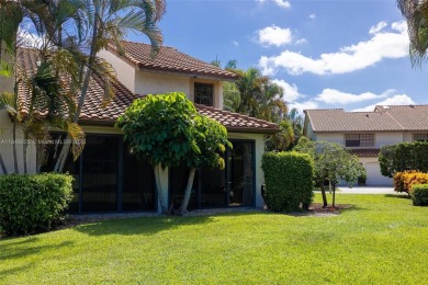 Beautifully upgraded end-unit townhome with stunning lake and on Boca Pointe Country Club in Florida - for sale on GolfHomes.com, golf home, golf lot