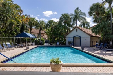 Beautifully upgraded end-unit townhome with stunning lake and on Boca Pointe Country Club in Florida - for sale on GolfHomes.com, golf home, golf lot