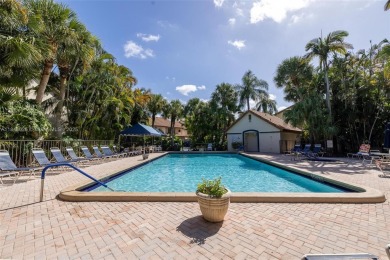 Beautifully upgraded end-unit townhome with stunning lake and on Boca Pointe Country Club in Florida - for sale on GolfHomes.com, golf home, golf lot