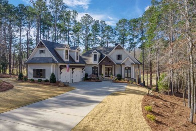 Experience luxury living in this stunning custom home, nestled on Reynolds Lake Oconee - The Landing in Georgia - for sale on GolfHomes.com, golf home, golf lot