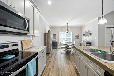Welcome to this beautifully designed 5-bedroom, 4-bath home in on Canongate At Healy Point Country Club in Georgia - for sale on GolfHomes.com, golf home, golf lot