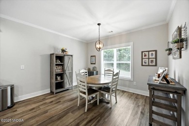 Welcome to this beautifully designed 5-bedroom, 4-bath home in on Canongate At Healy Point Country Club in Georgia - for sale on GolfHomes.com, golf home, golf lot