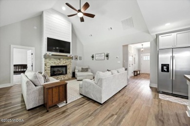 Welcome to this beautifully designed 5-bedroom, 4-bath home in on Canongate At Healy Point Country Club in Georgia - for sale on GolfHomes.com, golf home, golf lot