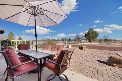 Resort style living, morning coffee on the back patio enjoying on Verde Santa Fe Golf Club in Arizona - for sale on GolfHomes.com, golf home, golf lot