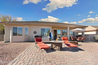 Resort style living, morning coffee on the back patio enjoying on Verde Santa Fe Golf Club in Arizona - for sale on GolfHomes.com, golf home, golf lot