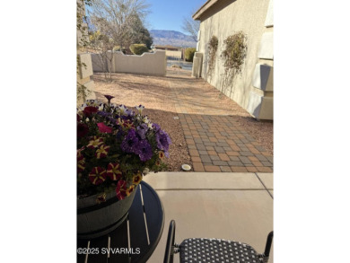 Resort style living, morning coffee on the back patio enjoying on Verde Santa Fe Golf Club in Arizona - for sale on GolfHomes.com, golf home, golf lot