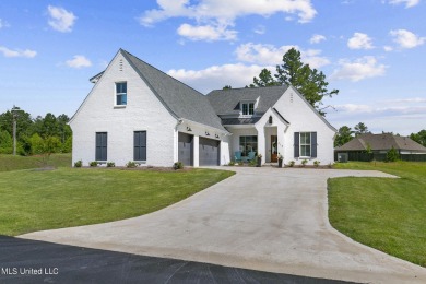 Welcome Home to 214 Lake Ridge Drive in the Renown Subdivision on Lake Caroline Golf Club in Mississippi - for sale on GolfHomes.com, golf home, golf lot