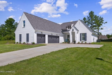 Welcome Home to 214 Lake Ridge Drive in the Renown Subdivision on Lake Caroline Golf Club in Mississippi - for sale on GolfHomes.com, golf home, golf lot