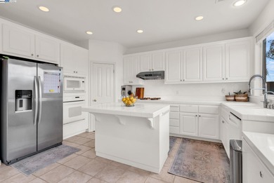 Welcome to this stunning 4-bed, 3-bath, 2,437 sq ft home located on Shadow Lakes Golf Club in California - for sale on GolfHomes.com, golf home, golf lot