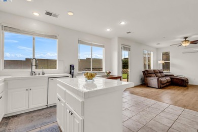 Welcome to this stunning 4-bed, 3-bath, 2,437 sq ft home located on Shadow Lakes Golf Club in California - for sale on GolfHomes.com, golf home, golf lot