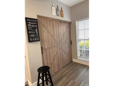 Step into this spacious 2-bedroom, 2.5-bath home that blends on Miccosukee Golf and Country Club in Florida - for sale on GolfHomes.com, golf home, golf lot