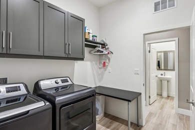 Step into the epitome of refined desert living with this on Plantation Golf Club in California - for sale on GolfHomes.com, golf home, golf lot