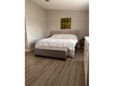 Step into this spacious 2-bedroom, 2.5-bath home that blends on Miccosukee Golf and Country Club in Florida - for sale on GolfHomes.com, golf home, golf lot