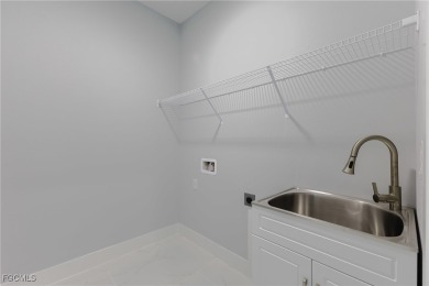 Discover the perfect blend of comfort, style, and location in on Burnt Store Golf Club in Florida - for sale on GolfHomes.com, golf home, golf lot