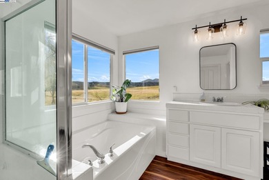 Welcome to this stunning 4-bed, 3-bath, 2,437 sq ft home located on Shadow Lakes Golf Club in California - for sale on GolfHomes.com, golf home, golf lot