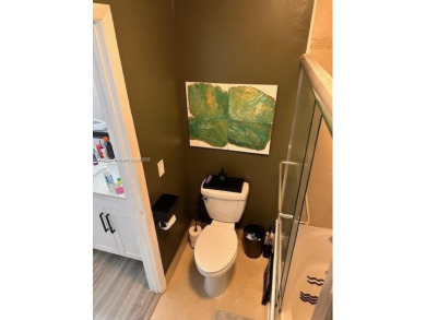 Step into this spacious 2-bedroom, 2.5-bath home that blends on Miccosukee Golf and Country Club in Florida - for sale on GolfHomes.com, golf home, golf lot