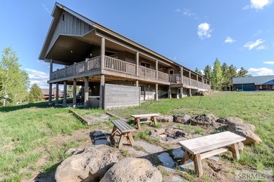 Modern Mountain Escape on the Golf Course! Experience mountain on Island Park Village Resort Golf Course in Idaho - for sale on GolfHomes.com, golf home, golf lot