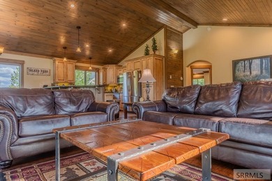 Modern Mountain Escape on the Golf Course! Experience mountain on Island Park Village Resort Golf Course in Idaho - for sale on GolfHomes.com, golf home, golf lot