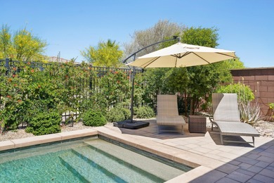 Step into the epitome of refined desert living with this on Plantation Golf Club in California - for sale on GolfHomes.com, golf home, golf lot