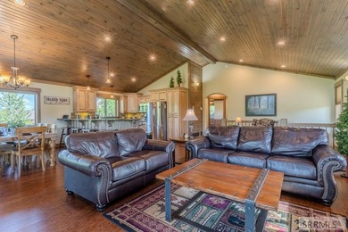 Modern Mountain Escape on the Golf Course! Experience mountain on Island Park Village Resort Golf Course in Idaho - for sale on GolfHomes.com, golf home, golf lot