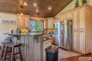 Modern Mountain Escape on the Golf Course! Experience mountain on Island Park Village Resort Golf Course in Idaho - for sale on GolfHomes.com, golf home, golf lot