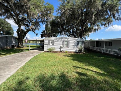 LAKEFRONT, SELLER IS VERY MOTIVATED, BRING ALL OFFERS! Home is on Water Oak Country Club Estates in Florida - for sale on GolfHomes.com, golf home, golf lot