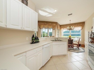 This stunning ground-floor end unit nestled in the prestigious on Naples Lakes Country Club in Florida - for sale on GolfHomes.com, golf home, golf lot