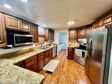LAKEFRONT, SELLER IS VERY MOTIVATED, BRING ALL OFFERS! Home is on Water Oak Country Club Estates in Florida - for sale on GolfHomes.com, golf home, golf lot