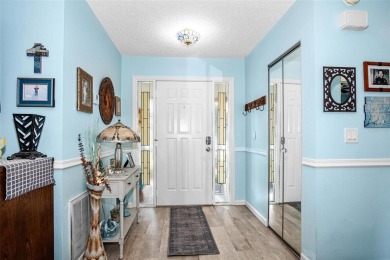 This home is situated in a quiet neighborhood in Sun City Center on Caloosa Greens Executive Golf Course in Florida - for sale on GolfHomes.com, golf home, golf lot